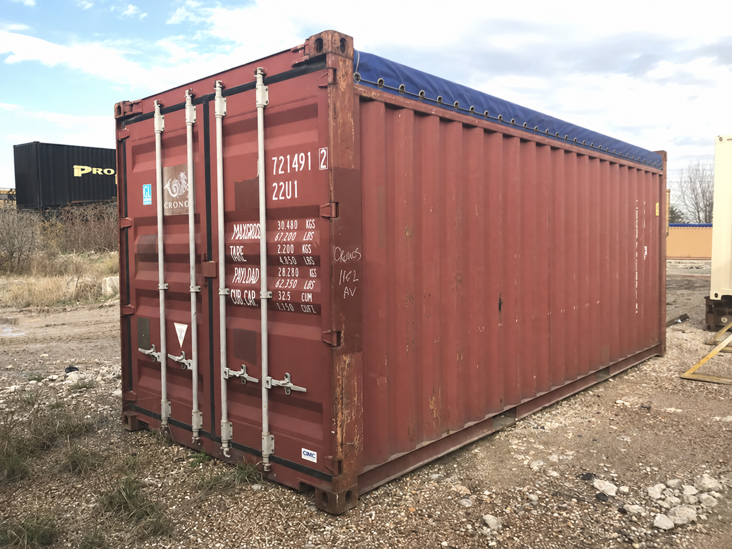 20-foot open top container with a red tarpaulin roof cover